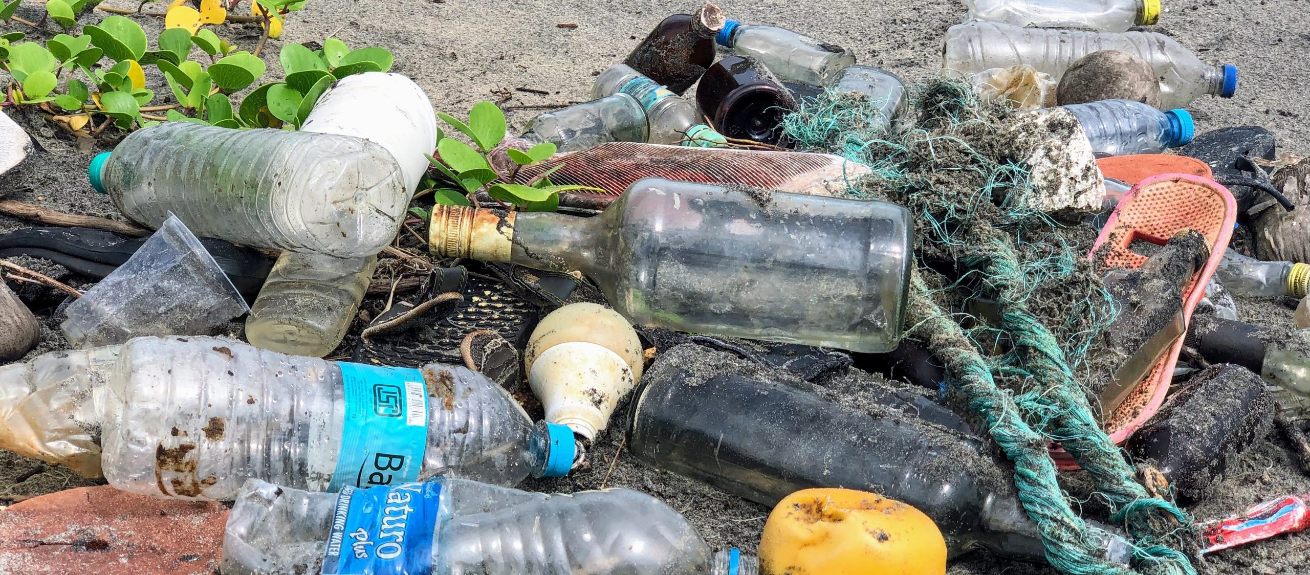 Water Bottles On Beach
